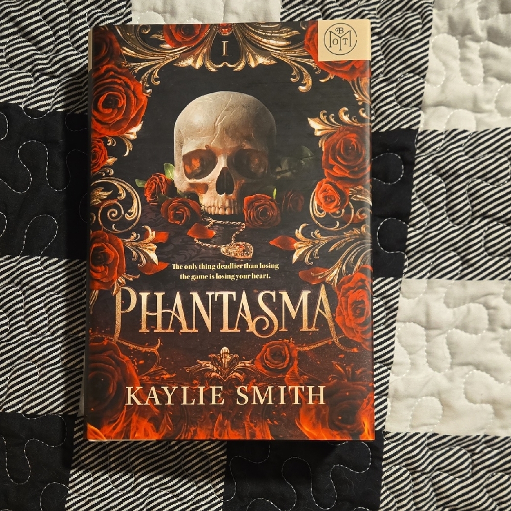 Phantasma Book with Skull and Roses Cover